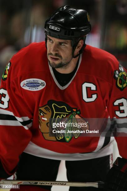 Adrian Aucoin of the Chicago Blackhawks looks on during warmups before the game against the Nashville Predators on January 5, 2007 at the United...