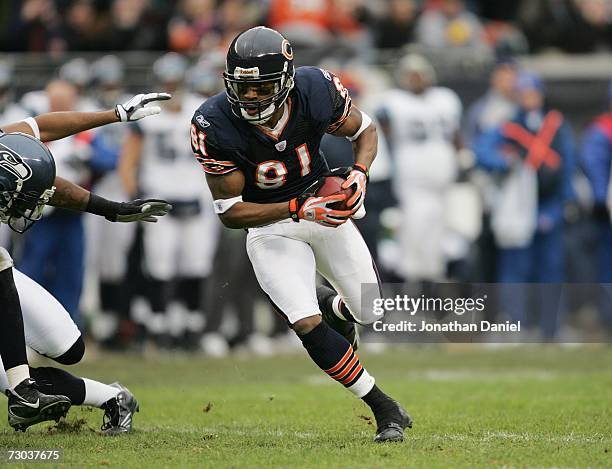 Wide receiver Rashied Davis of the Chicago Bears carries the ball against the Seattle Seahawks during their NFC Divisional Playoff game on January...