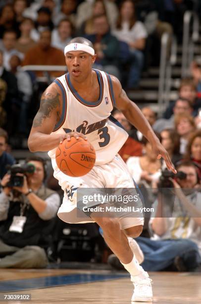 Caron Butler of the Washington Wizards drives against the Memphis Grizzlies during the game at the Verizon Center on December 26, 2006 in Washington,...