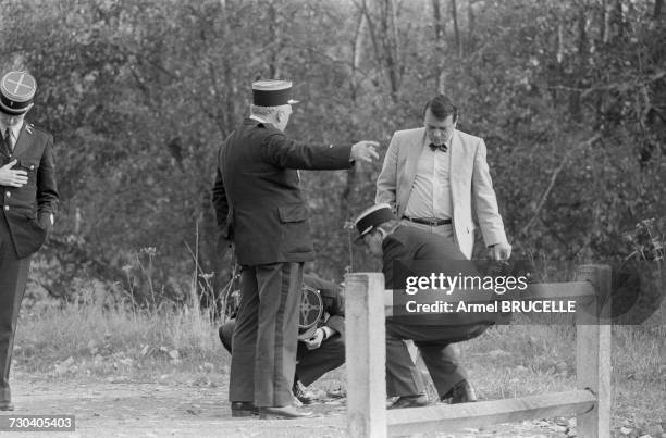 The prosecutor and police at the crime scene near Docelles in the French department of Vosges, after the murder of four year-old Grégory Villemin ....