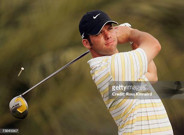 Paul Casey of Engalnd tees off on the par four 14th hole during the second round of the Abu Dhabi Golf Championship at the Abu Dhabi Golf Club on...