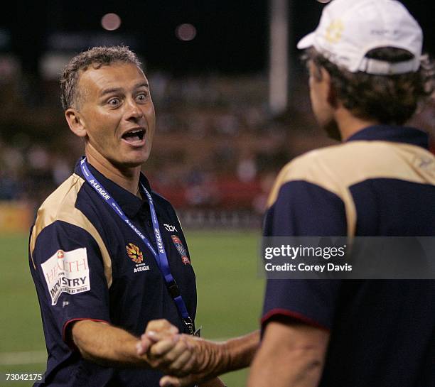 Jets coach Gary Van Egmond is congratulated after winning the round 21 Hyundai A-League match between the Newcastle Jets and the Melbourne Victory at...