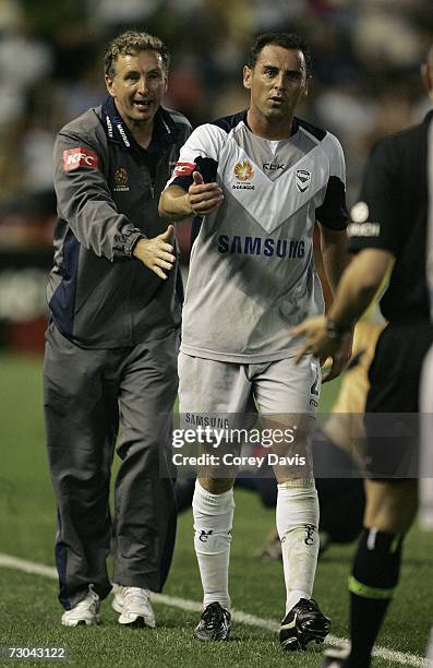 Victory coach Ernie Merrick attempts to get Kevin Muscat back into the game after he substituted himself during the round 21 Hyundai A-League match...