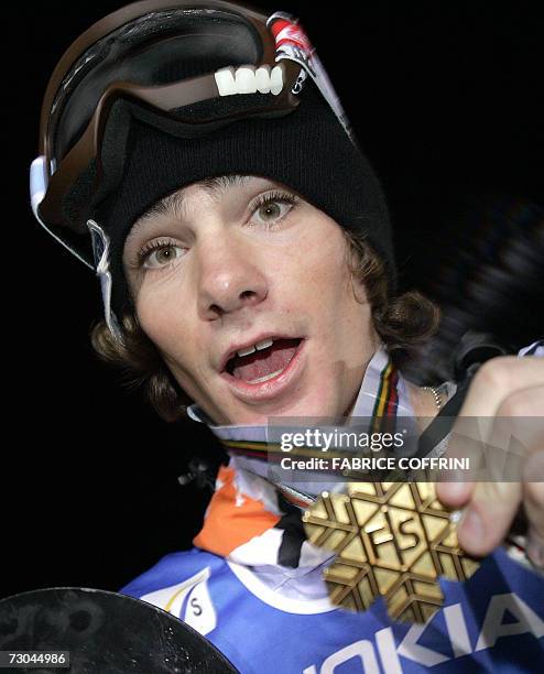 New world champion Mathieu Crepel of France shows his gold medal won in the men's Big Air final at the FIS Snowboard World championships in Arosa 19...