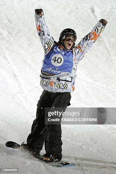 New world champion Mathieu Crepel of France reacts after his final jump in the men's Big Air final at the FIS Snowboard World championships in Arosa...