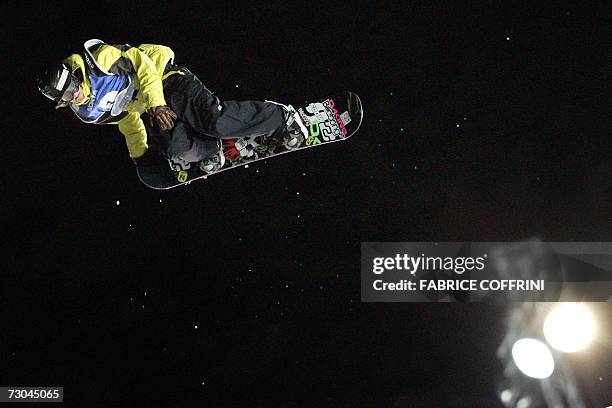 Antti Autti is airborne on his way to capture the silver during his jump in the men's Big Air final at the FIS Snowboard World championships in...