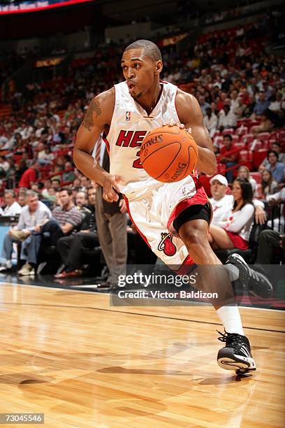 Robert Hite of the Miami Heat drives against the Phoenix Suns during the game at American Airlines Arena on December 13, 2006 in Miami, Florida. The...