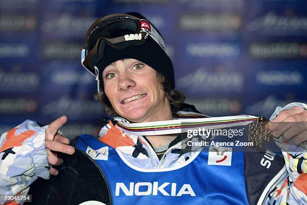 Mathieu Crepel from France celebrates taking 1st place during the FIS Snowboard World Championships Men's Big Air on January 19, 2007 in Arosa,...