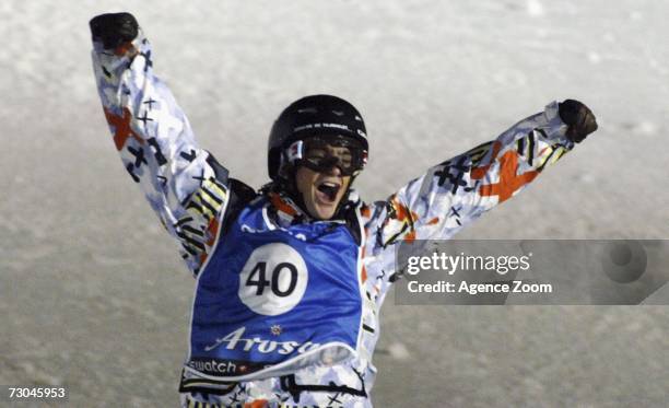 Mathieu Crepel from France celebrates taking 1st place during the FIS Snowboard World Championships Men's Big Air on January 19, 2007 in Arosa,...