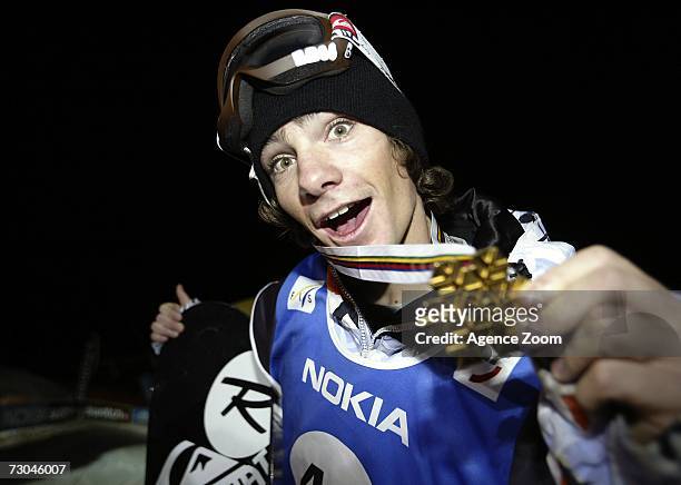 Mathieu Crepel from France celebrates taking 1st place during the FIS Snowboard World Championships Men's Big Air on January 19, 2007 in Arosa,...
