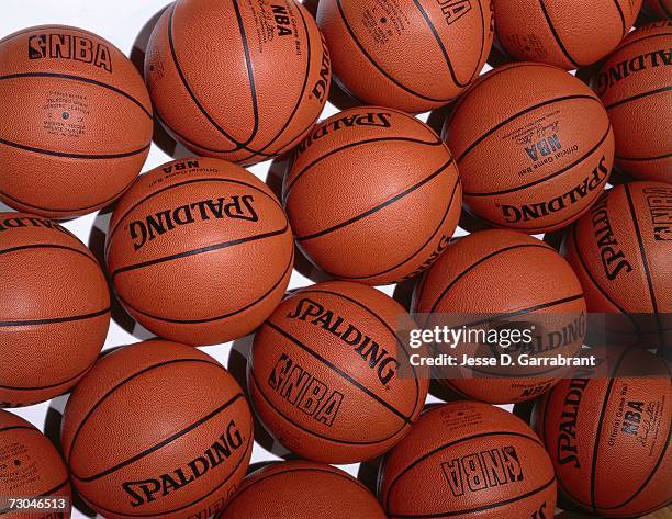 Photograph of a group of Spalding issued official NBA basketballs circa 1999. NOTE TO USER: User expressly acknowledges that, by downloading and or...