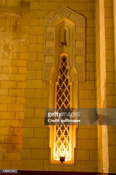 illuminated view of the wall outside the mosque - jumeirah mosque stock pictures, royalty-free photos & images