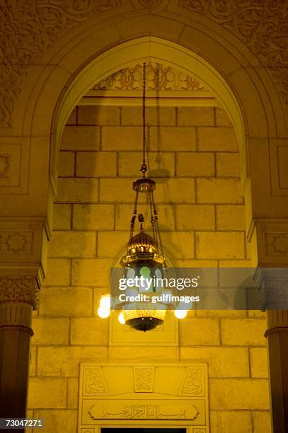 illuminated view of the wall outside the mosque - jumeirah mosque stock pictures, royalty-free photos & images