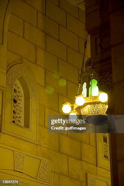 illuminated view of the wall outside the mosque - jumeirah mosque stock pictures, royalty-free photos & images