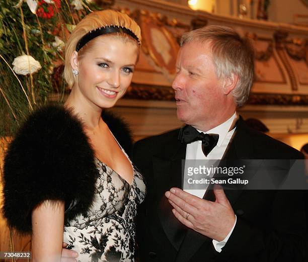 Lena Gercke, also known as Lena G., winner of "Germany's Next Topmodel," and television host Juergen Fliege attend the 2nd annual Semper Opera Ball...