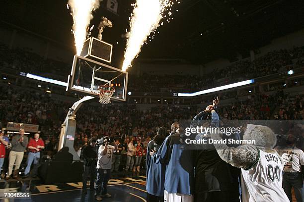 The Minnesota Timberwolves huddle on court before the game against the Detroit Pistons at the Target Center on January 19, 2007 in Minneapolis,...