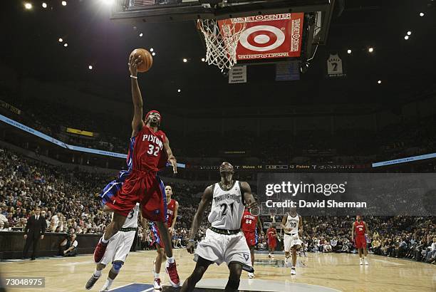 Richard Hamilton of the Detroit Pistons drives to the basket against Kevin Garnett of the Minnesota Timberwolves at the Target Center on January 19,...