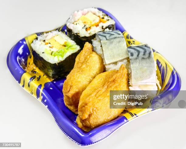 lunch boxes - inarizushi stock-fotos und bilder
