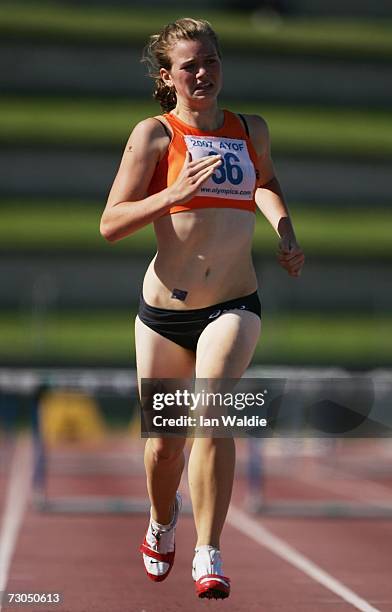 Bianca Mignot from Australia competes in the women 18 and under 400 metres hurdles event at the Australian Youth Olympic Festival January 20, 2007 in...