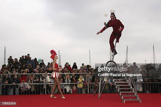 An acrobatic act performs during the Street Circus Parade during the 31st International Circus Festival of Monte-Carlo on January 20, 2007 in Monaco.