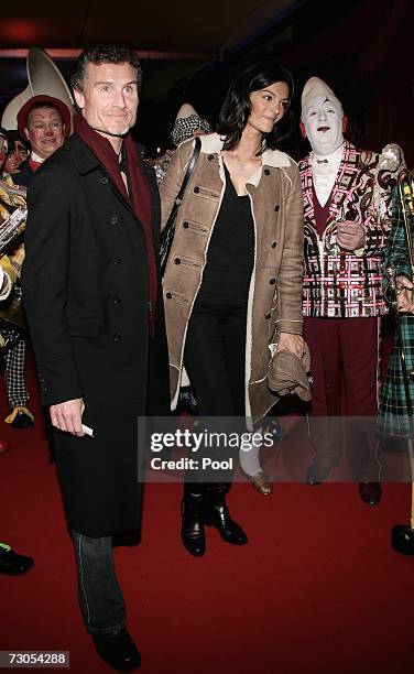 Former Formula one driver David Coulthard arrives with a guest to attend the 31st International Circus Festival of Monte Carlo on January 20, 2007 in...