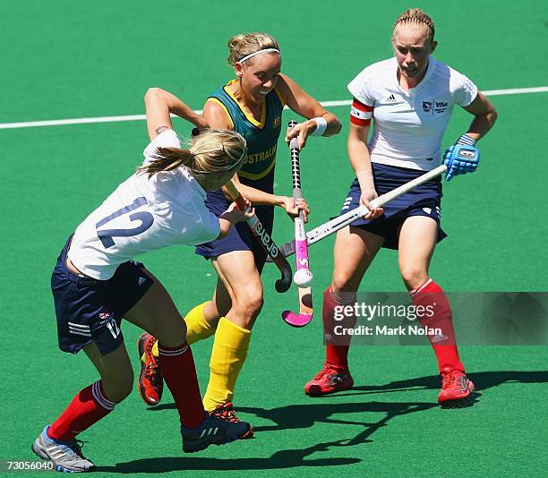 Fiona Boyce of Australia takes on Suzie Gilbert and Natalie Seymour of Great Britain in the gold medal match between Australia and Great Britain...