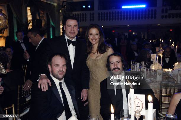 In this handout photo provided by the Church of Scientology, actors Ethan Suplee, John Travolta, Kelly Preston, and Jason Lee attend the 80th...