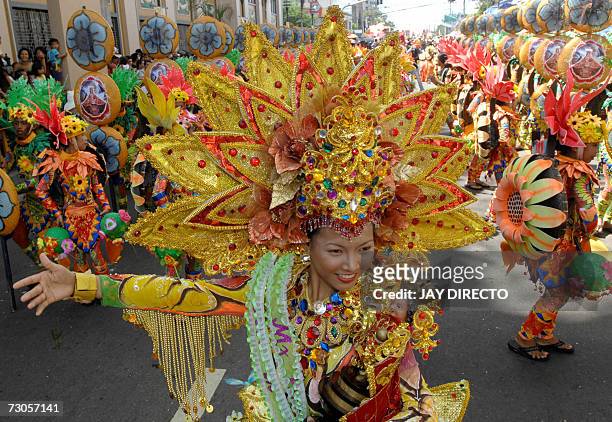 Performers dancing in the street, during the culmination of the nine-day religious festival called Sinulog, in Cebu city central Philippines 21...