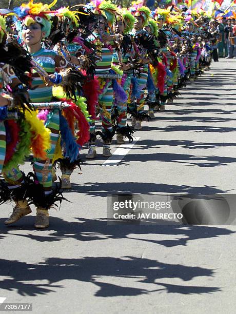 Performers dance in the street during the culmination of the nine-day religious festival called Sinulog, in Cebu city central Philippines 21 January...