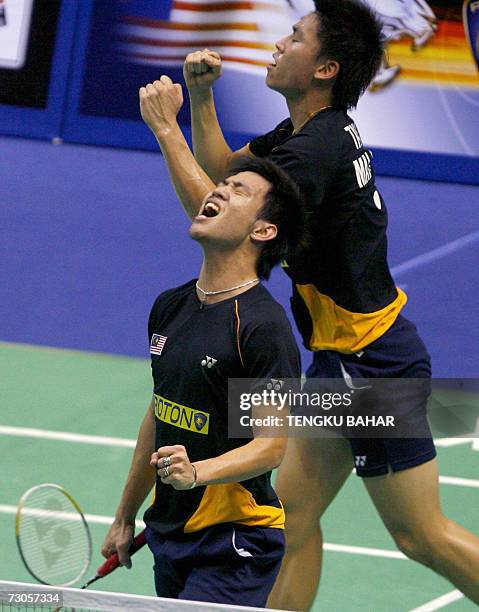 Kuala Lumpur, MALAYSIA: Malaysia's Koo Kien Keat and Tan Boon Heong react after reaching match point before defeating Indonesia-US doubles team...