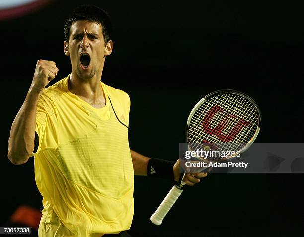 Novak Djokovic of Serbia celebrates winning a point during his fourth round match against Roger Federer of Switzerland on day seven of the Australian...