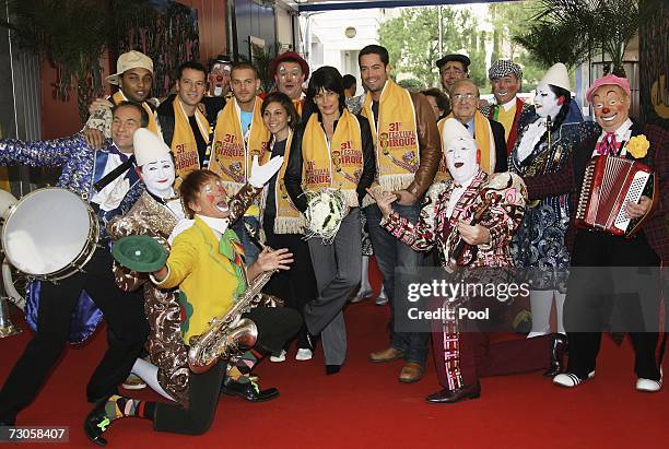 French Singers M.Pokora , Leslie and Emmanuel Moire pose with Princess Stephanie of Monaco as they arrive to attend the 31st International Circus...