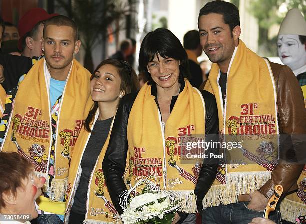 French Singers M.Pokora , Leslie and Emmanuel Moire pose with Princess Stephanie of Monaco as they arrive to attend the 31st International Circus...