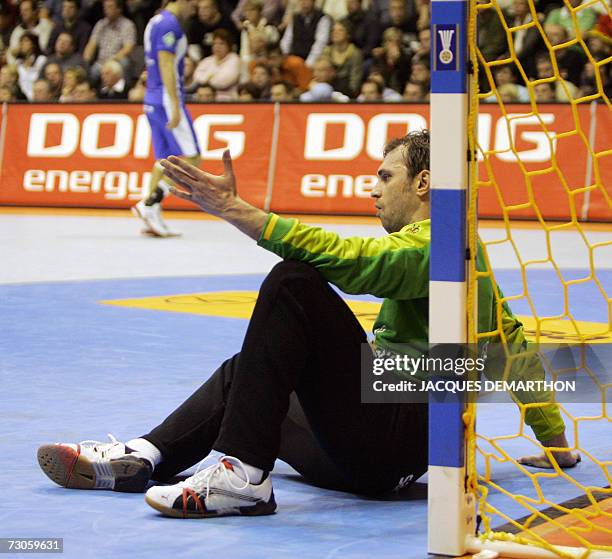 Iceland's goalkeeper Roland Eradze reacts after taking a goal during the Ukraine-Iceland Group B match of the preliminary round of the Men's Handball...