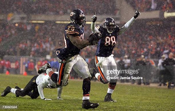Thomas Jones of the Chicago Bears runs the ball in for a touchdown in the fourth quarter against the New Orleans Saints during the NFC Championship...
