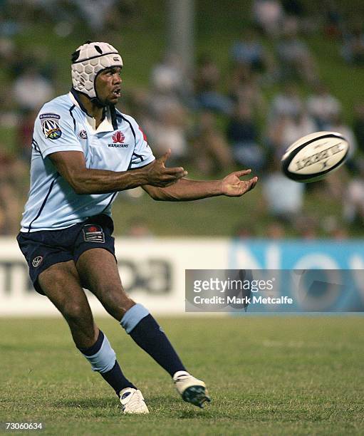 Kurtley Beale of the Waratahs passes the ball during the Super 14 Trial match between the Waratahs and the Brumbies at WIN Stadium January 20, 2007...