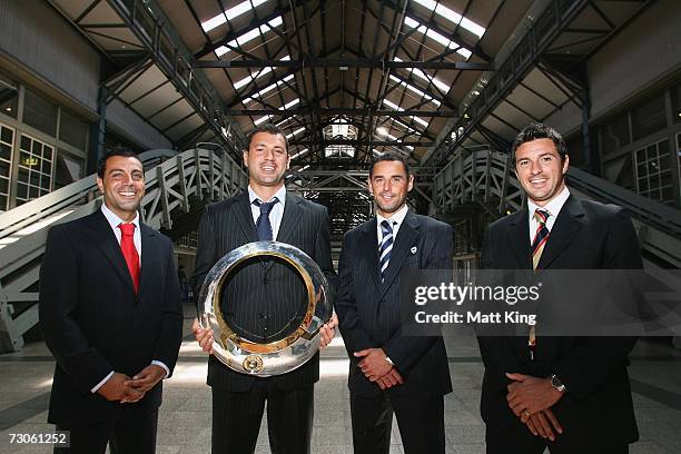 Ross Aloisi of Adelaide United, Mark Rudan of Sydney FC, Kevin Muscat of Melbourne Victory and Paul Okon of the Newcastle Jets pose for a photograph...