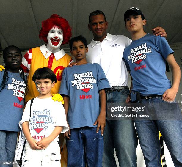 Alex Rodriguez and kids pose with Ronald McDonald at Family Fun Day benefiting the AROD Family Foundation and Ronald McDonald House Charities at The...