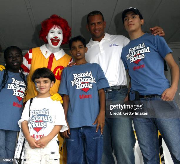 Alex Rodriguez and kids pose with Ronald McDonald at Family Fun Day benefiting the AROD Family Foundation and Ronald McDonald House Charities at The...