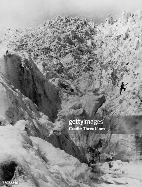 Lone climber on the Franz Josef Glacier on the South Island of New Zealand, circa 1935.