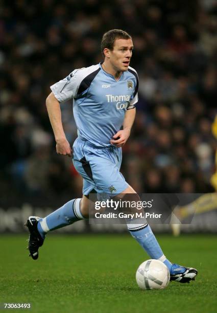 Richard Dunne of Manchester City in action during the FA Cup sponsored by E.ON Third Round Replay match between Manchester City and Sheffield...