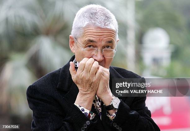 Zwitzerland's Claude Nobs founder and CEO of the Montreux Jazz Festival, plays a harmonica, 22 january in Cannes, during a photocall at the 41th...