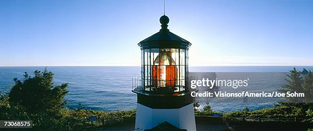 "sunset at cape meares lighthouse from 1890, oregon" - tillamook county stock-fotos und bilder