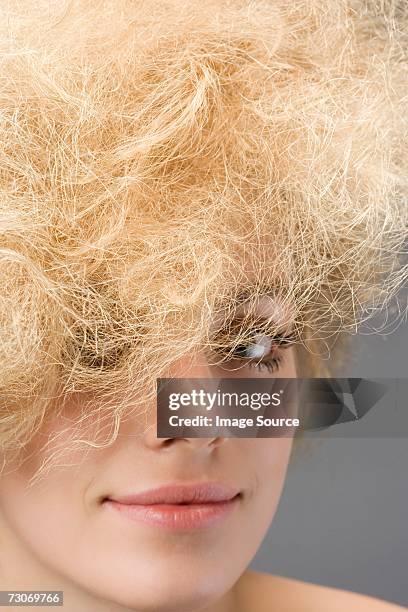 woman with frizzy hairstyle - frizzy stock pictures, royalty-free photos & images