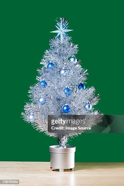 decorated christmas tree - fake stock pictures, royalty-free photos & images