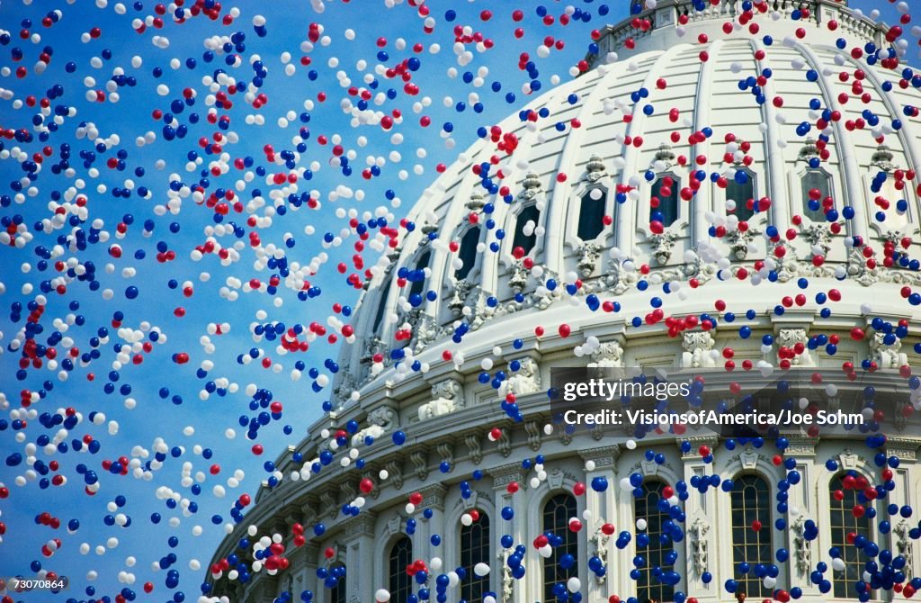 "This is the U.S. Capitol during the Bicentennial of the Constitution Celebration. There are red, white and blue balloons falling around the Capitol Dome. It marks the dates that commemorate the Centennial 1787-1987."