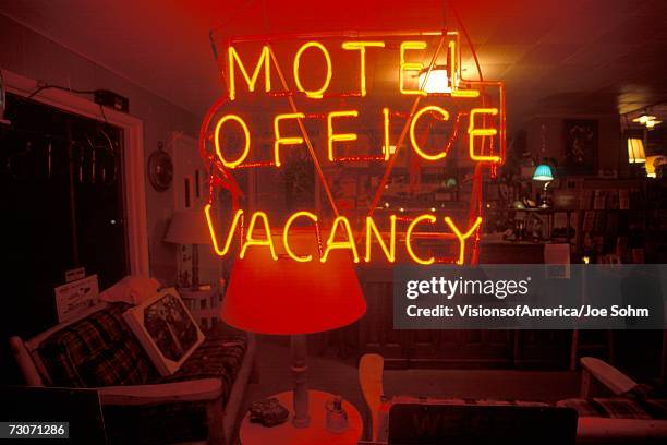 "a neon sign that reads ?motel office, vacancy?" - neon joe stock pictures, royalty-free photos & images