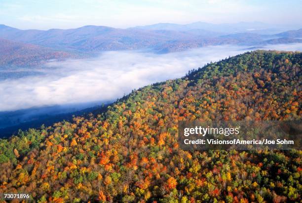 "aerial view of morning fog over mountains near stowe, vt in autumn along scenic route 100" - stowe vermont stock pictures, royalty-free photos & images