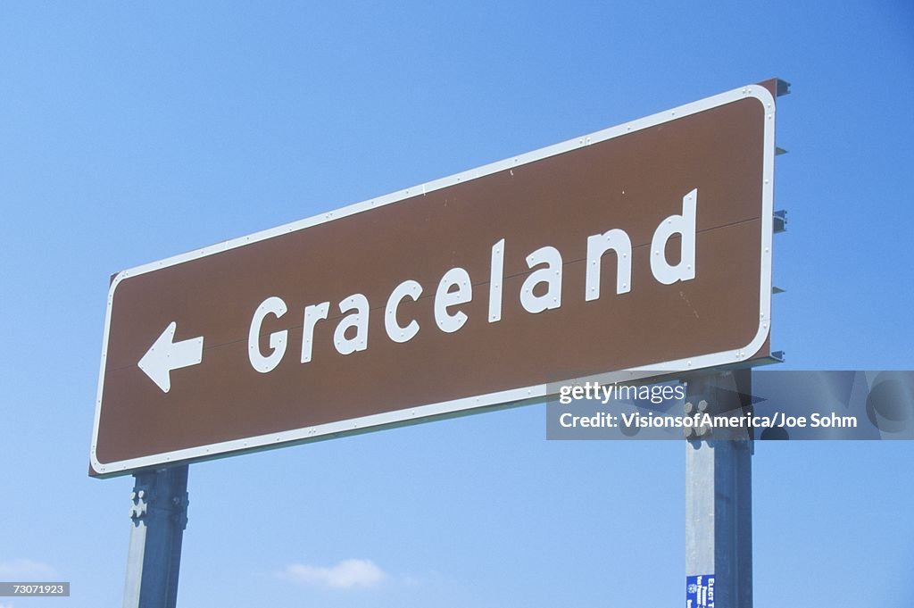 "Directional sign to Graceland, home of Elvis Presley, Memphis, TN"