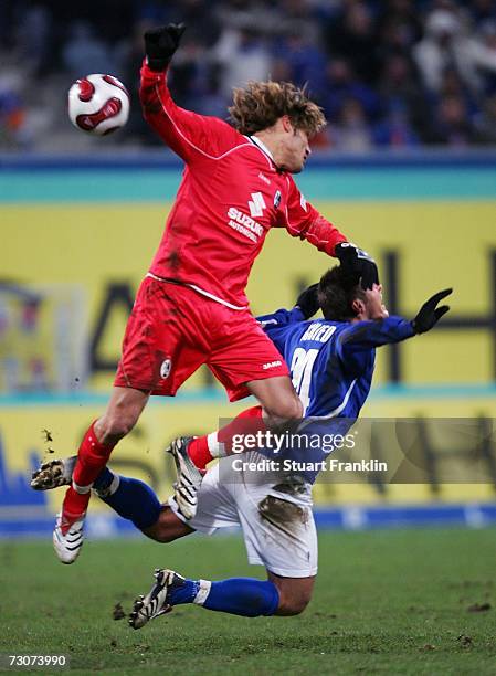 Boubacar Diarra of Freiburg is challenged by Marcel Schied of Rostock during the Second Bundesliga match between Hansa Rostock and SC Freiburg at the...
